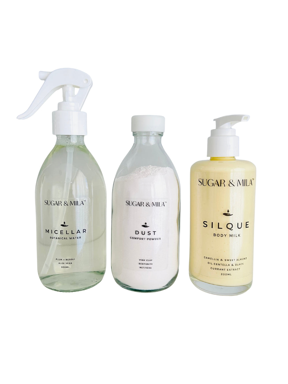 Three bottles of Sugar & Mila products on a white background