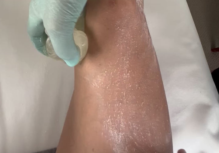 gliding sugar paste on a leg